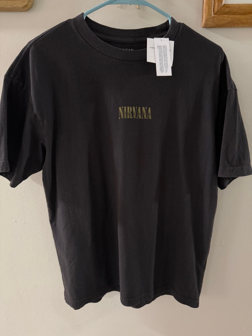 NIRVANA Black Short-Sleeve Tee with Gold Logo